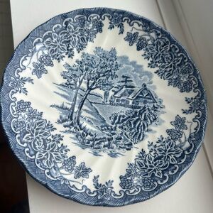 Blue and White Churchill Transferware Saucer in “The Brook” Pattern